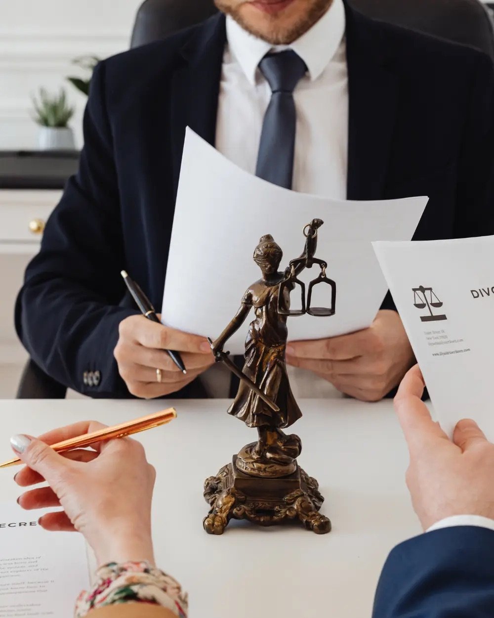 Attorney reviewing legal documents in a professional office