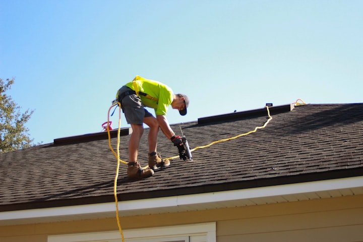 Roofer working on a residential roof